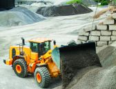 Radlader-HL975-Hyundai-Wienaeber-Baumaschinen-LR_HL975_front_working.jpg